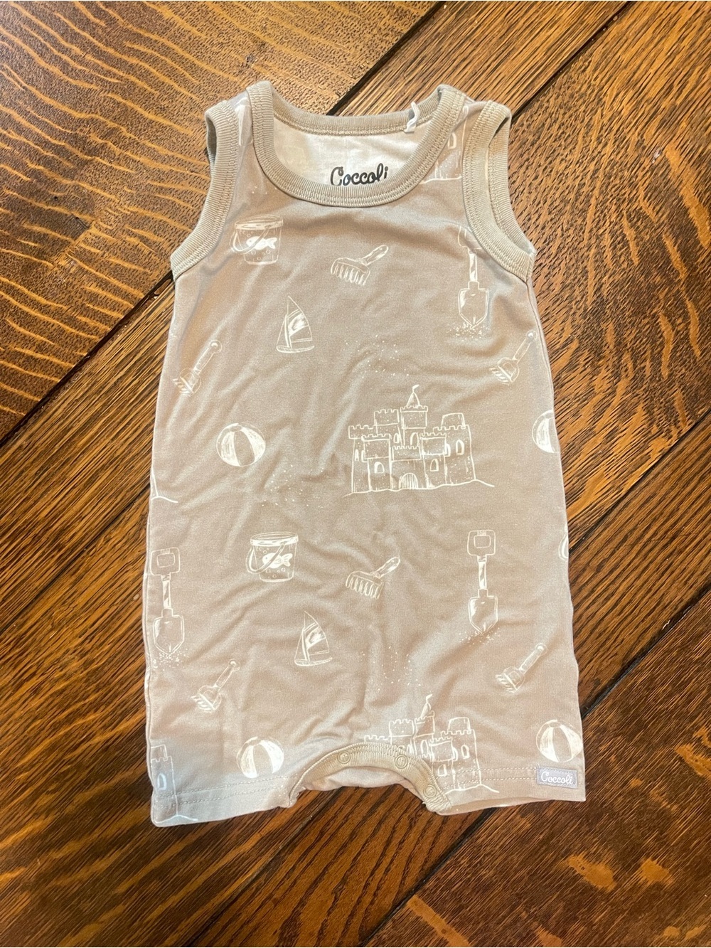 Coccoli Baby Sleeveless Romper in Taupe with Sandcastle Motif